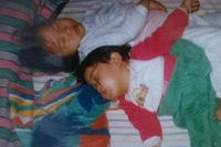 2PMテギョンが、幼少時に撮影されたあどけない寝顔の写真を公開した。写真＝テギョンのツイッターより